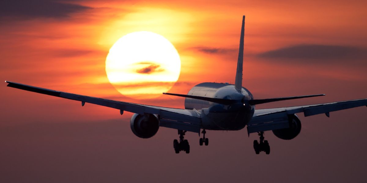 Airline flying at dusk time